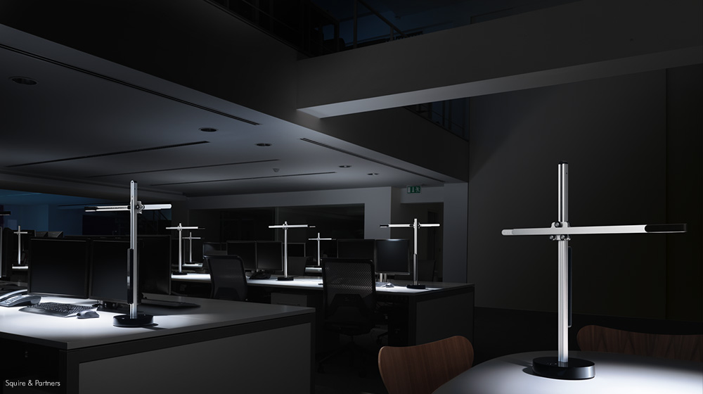 A dark empty office highlighting the high level of illumination of the CSYS task light.