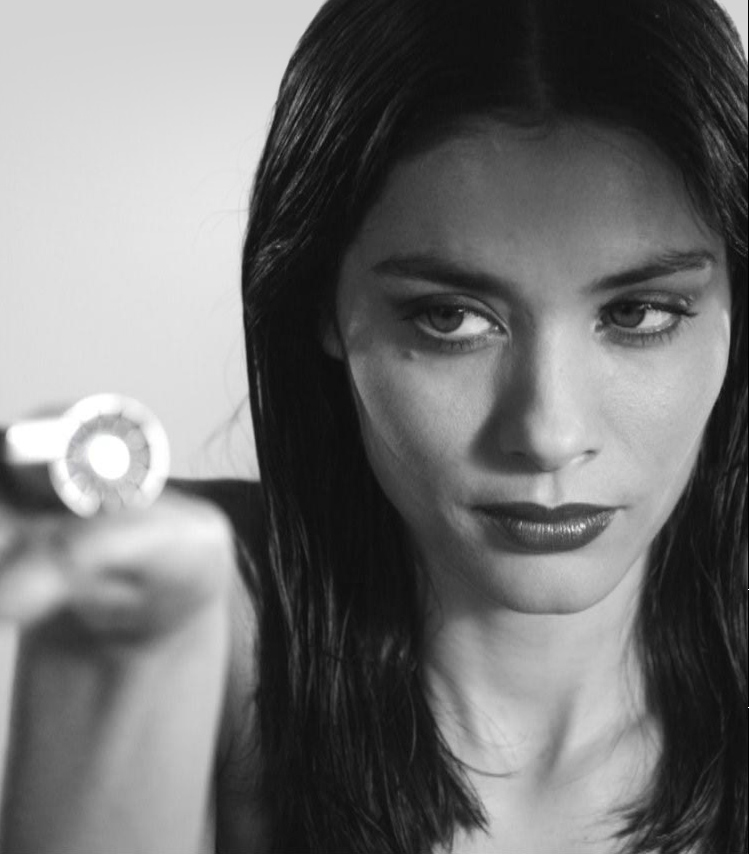 A woman holding the Dyson digital motor V9